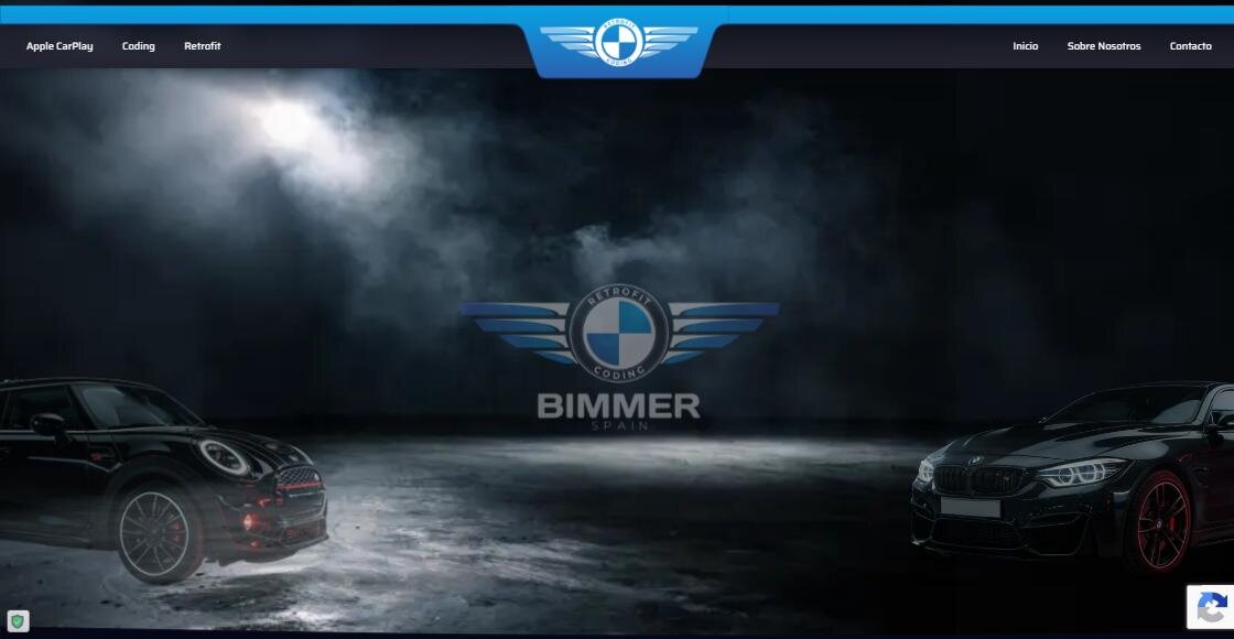 Portada de Bimmer Spain con dos coches BMW iluminados sobre fondo oscuro